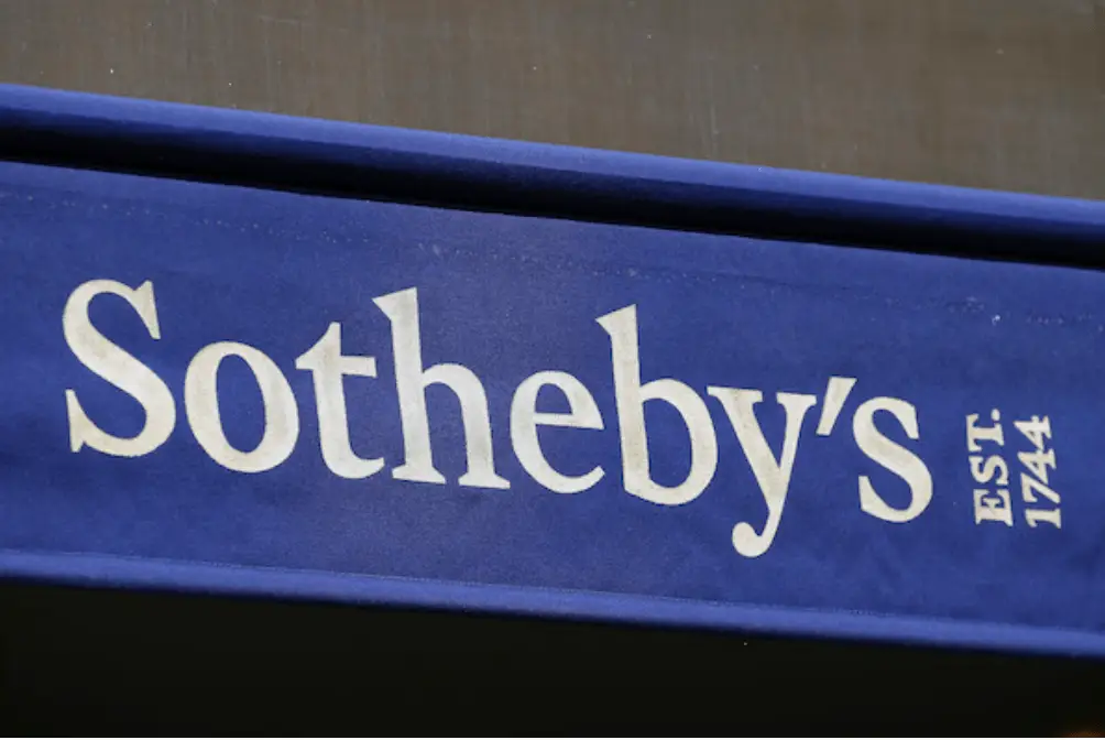 Sotheby's logo on a a blue background