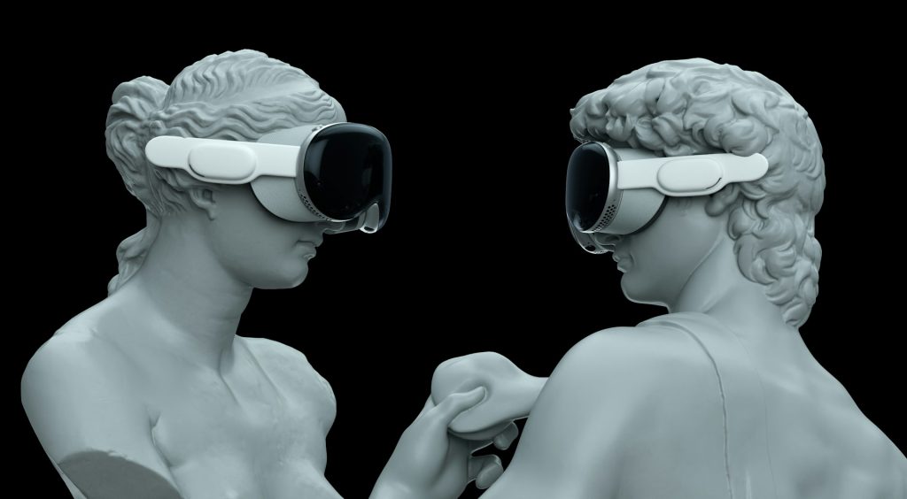 Two statues wearing VR goggles