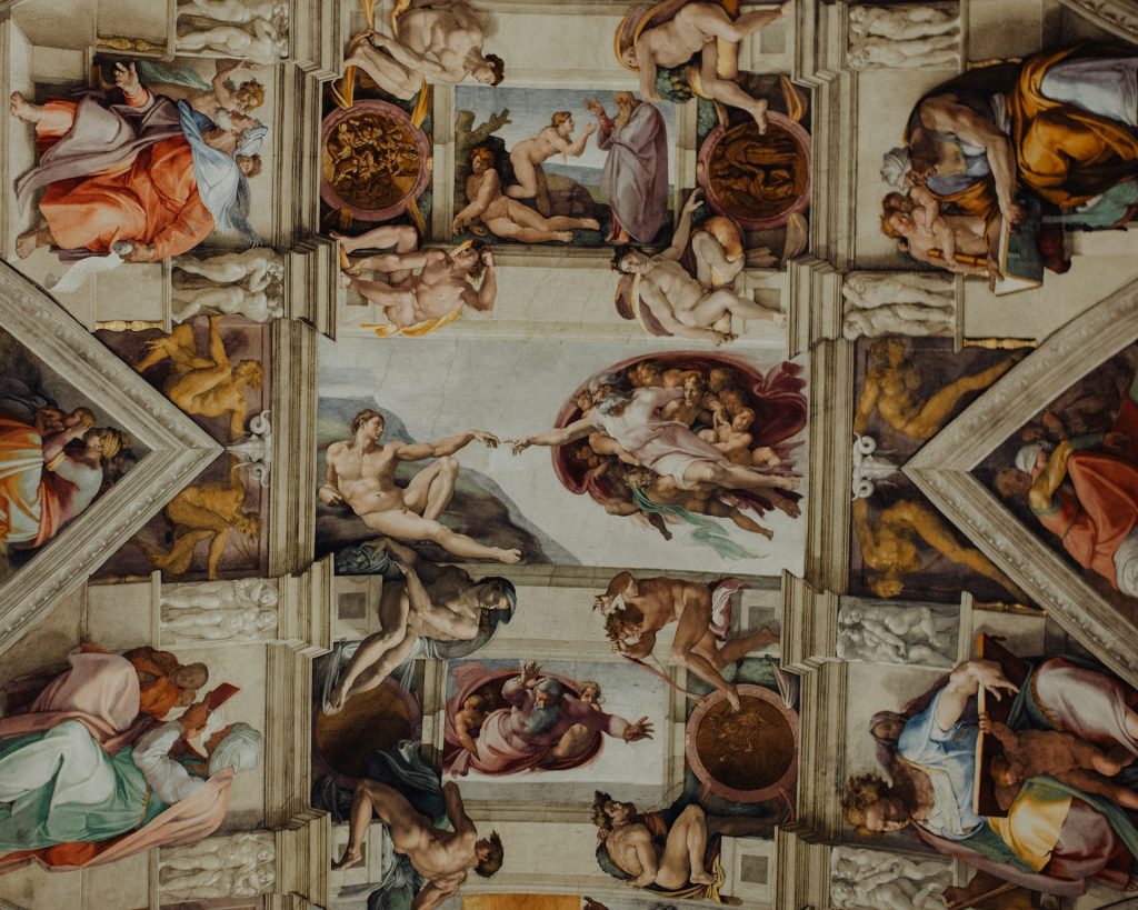 The part of the ceiling of the Sixtine chapel, wiith the Creation of Adam in the center