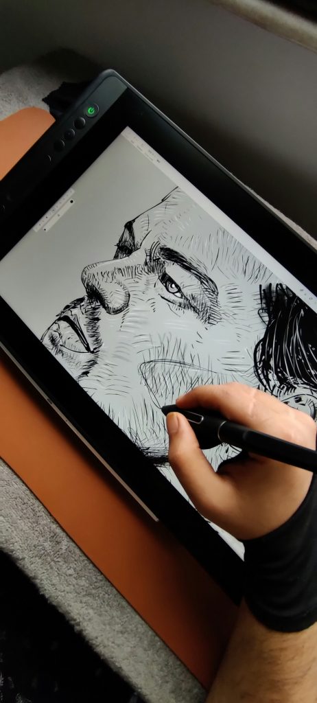 An image demonstraing digital drawings. A person drawing on a tablet