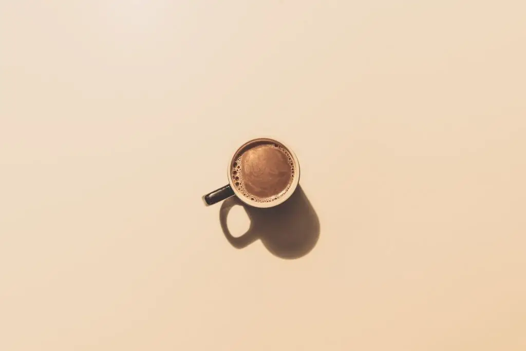 A minimalist photo of a coffee mug