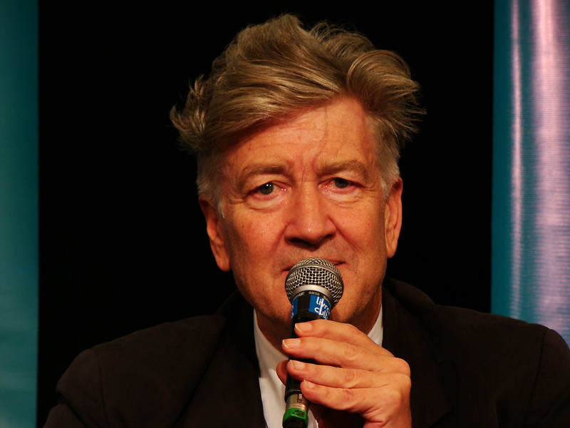 A shot of David Lynch talking into a microphone