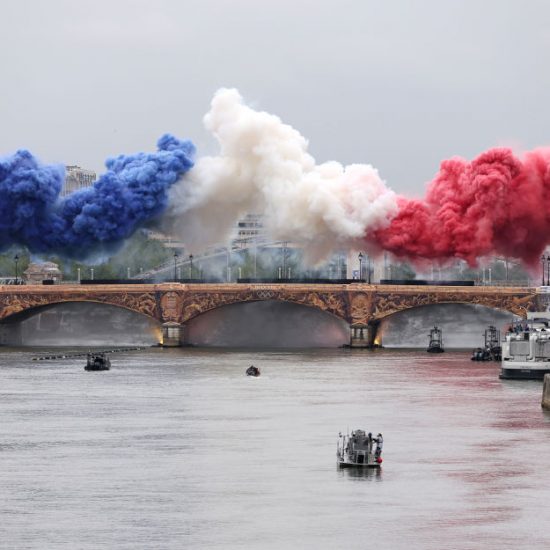 PARIS, FRANCE - JULY 26: Smoke resembling the flag of Team France is shown over Pont d’Austerlitz during the opening ceremony of the Olympic Games Paris 2024 on July 26, 2024 in Paris, France. (Photo by Lars Baron/Getty Images)