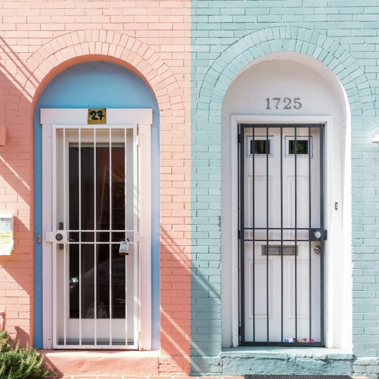 Two doors painted in pastel colors