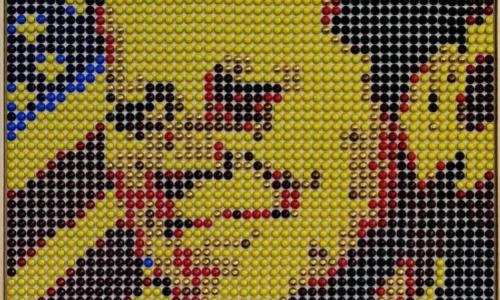 John F. Kennedy pixelated portrait by Ricardo Bellino crafted with recycled coffee capsules