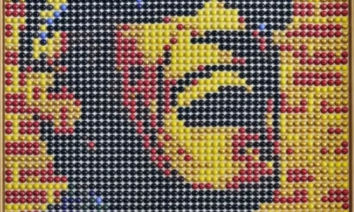 Ray Charles pixelated portrait by Ricardo Bellino crafted with recycled coffee capsules
